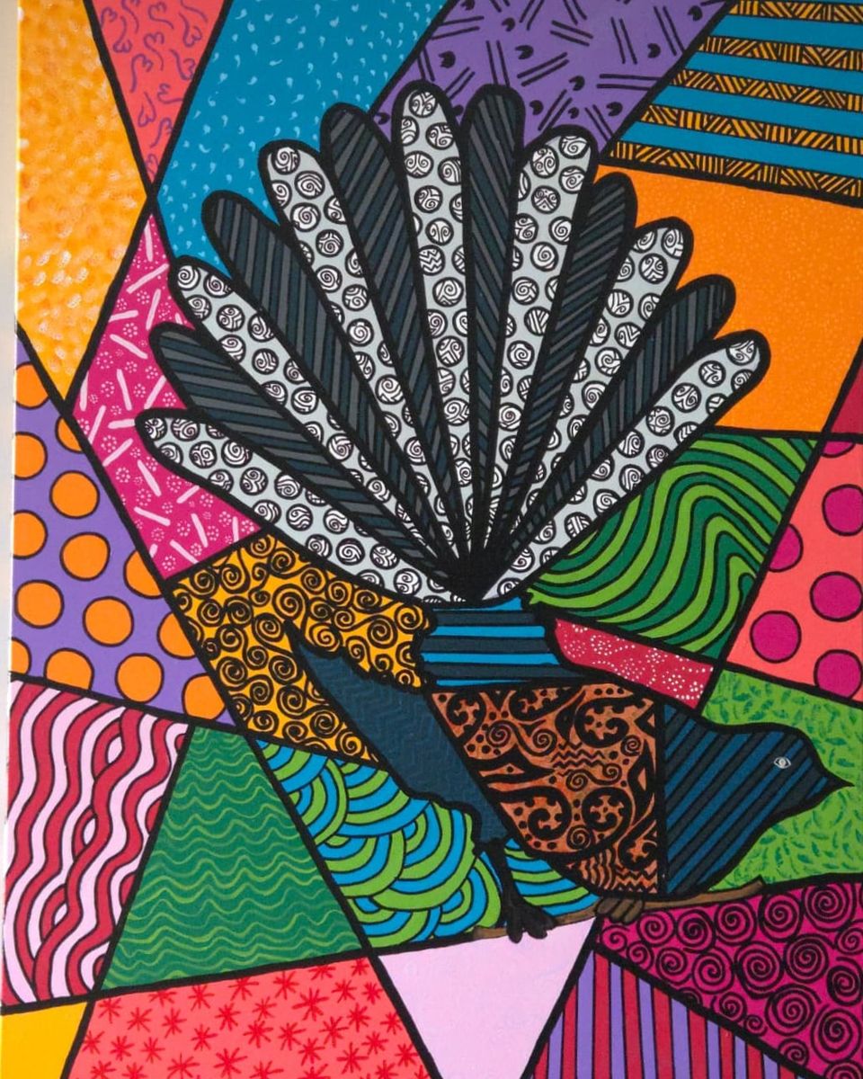 A fantail with its tail fanned wide in grey and white patterned feathers, its body in blue, orange and brown spirals, set against shards of orange, blue, pink and purple, every shape outlined in black.